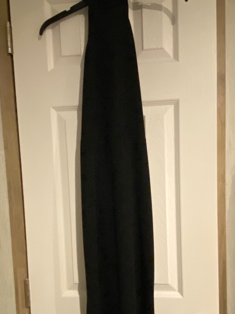 Ladies sleek black sleeveless dress